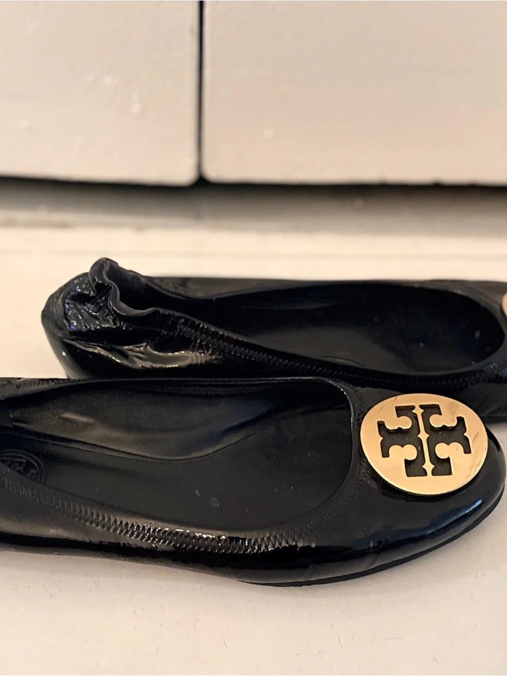 Tory Burch Black Patent Leather Logo Ballet Flats with Gold Emblem